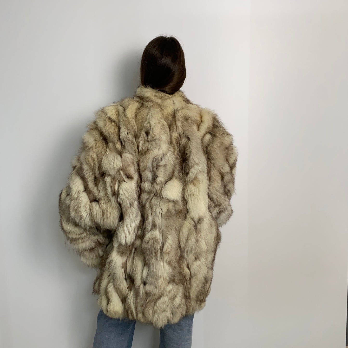 Pelliccia di volpe beige con sfumature marroni