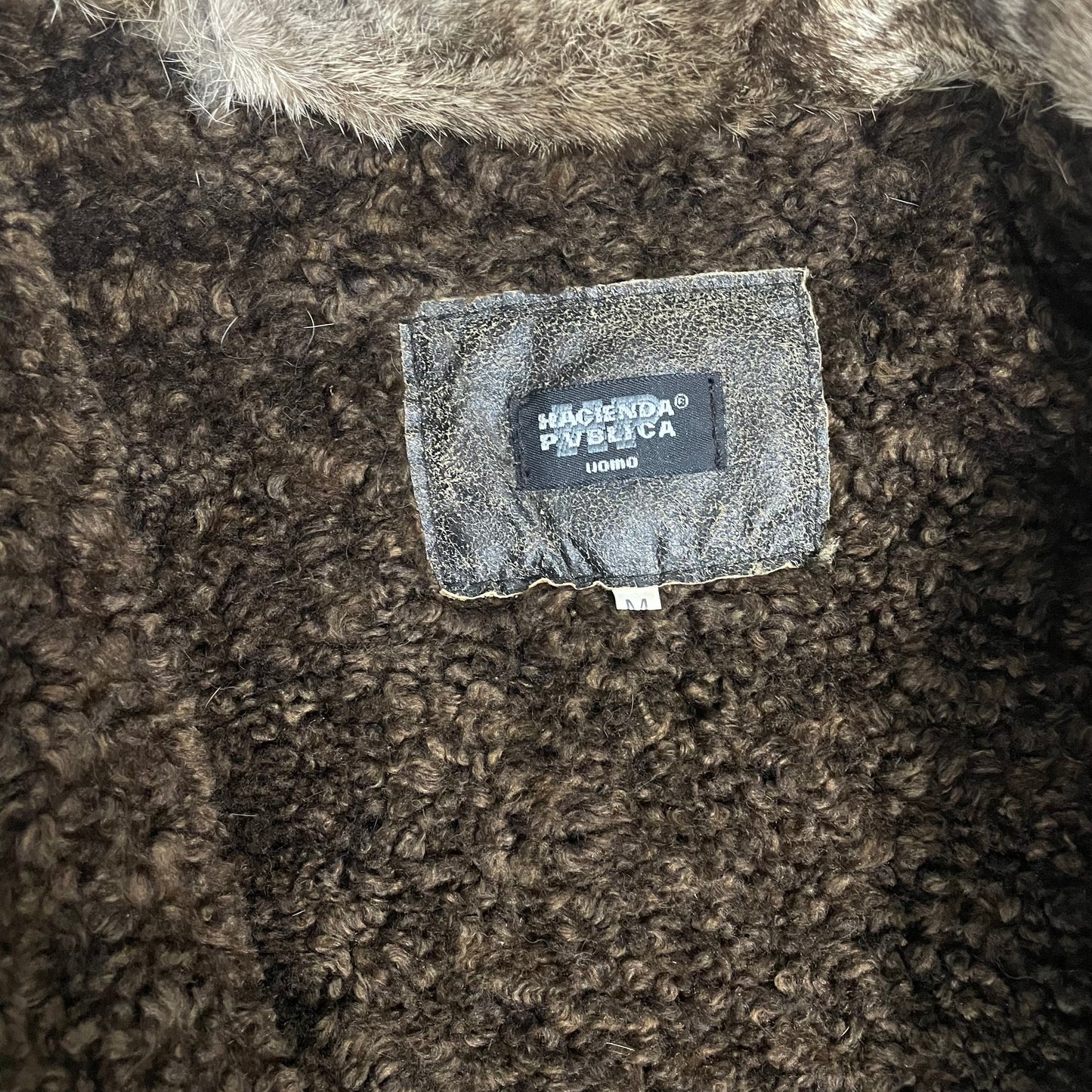 Giubbotto imbottito con collo in pelliccia